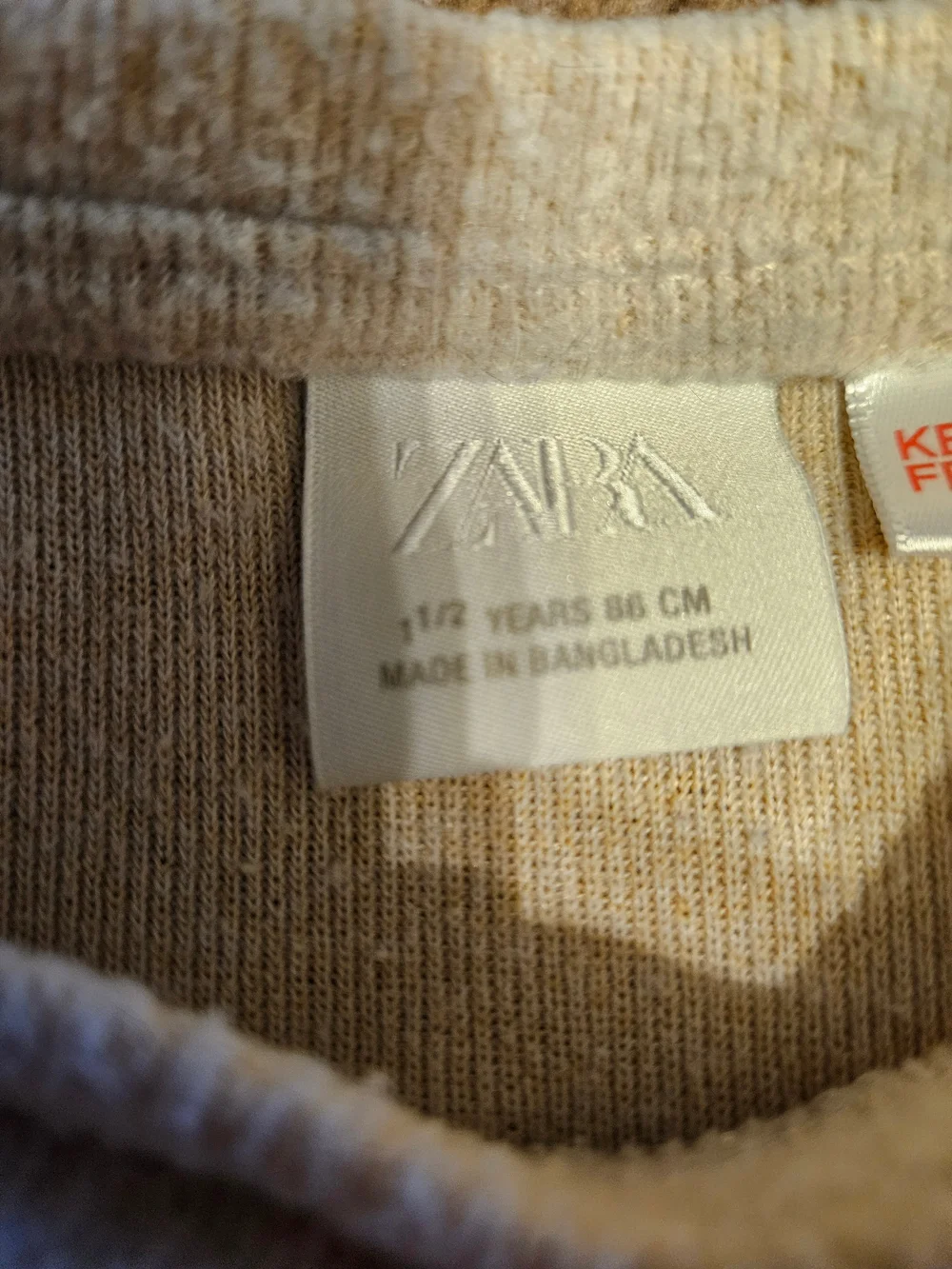 Zara Cream Peplum Light Sweater with Black Bow Details - Kids 18 Months